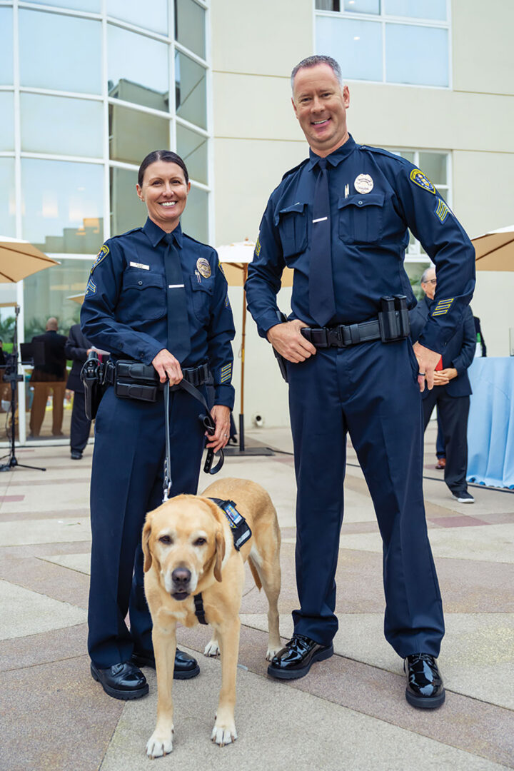 Natalie Hone, K9 Lyle Hope, and Jon Goebel