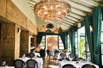 Paseo’s welcoming interiors feature glass chandeliers and rattan light fixtures