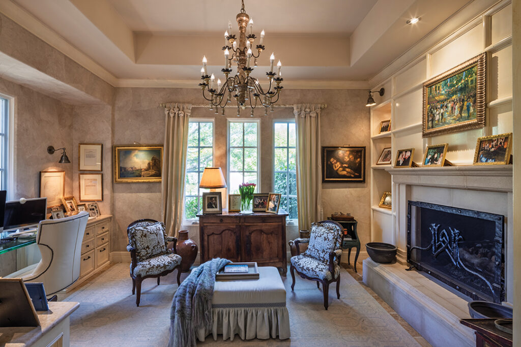 Walker’s art-filled office displays photos of family, friends, and the famous, including Ronald Reagan, Mikhail Gorbachev, Paul McCartney, Katie Couric, and more