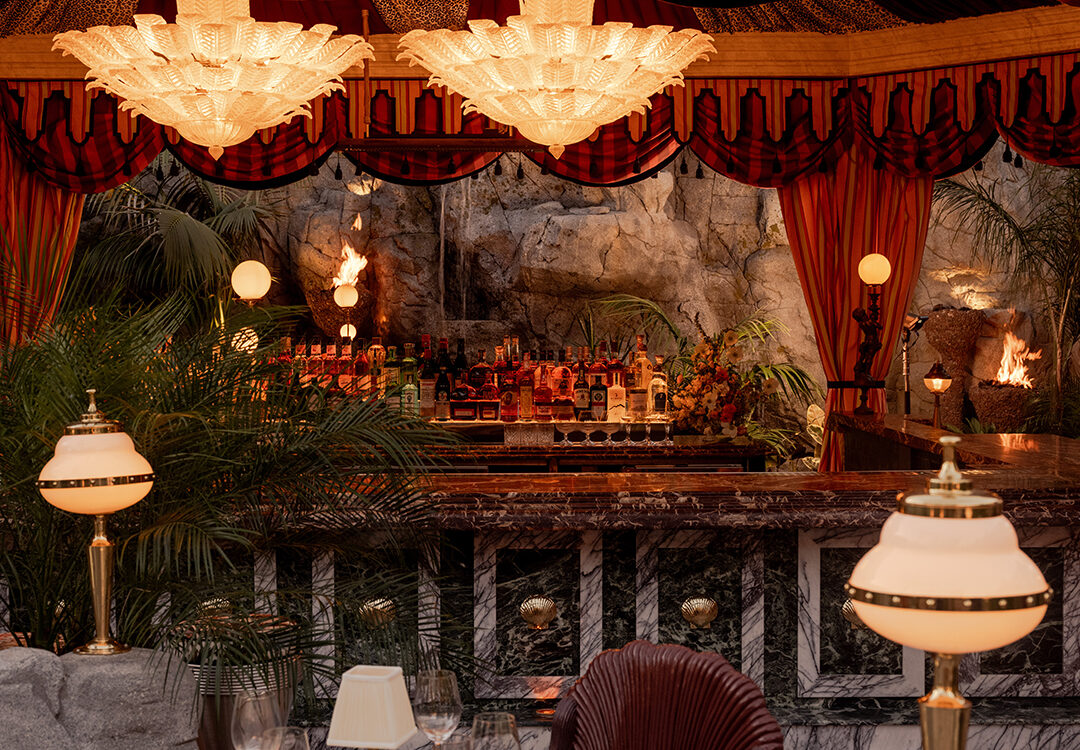 It’s the blue lagoon reimagined as Night Hawk, an open-fire Greek restaurant. Rock-formed booths and banquettes create nooks from which to review the overwrought design