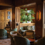 Soft, neutral tones, natural textures, and abundant light create a relaxed yet sophisticated setting