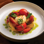 Local Farm Heirloom Tomatoes Salad: Burrata Cheese, Golden Balsamic, our Garden Fresh basil