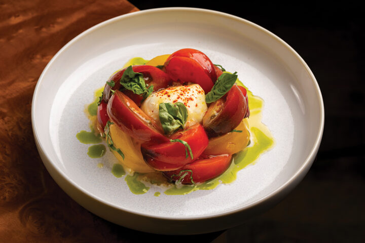 Local Farm Heirloom Tomatoes Salad: Burrata Cheese, Golden Balsamic, our Garden Fresh basil