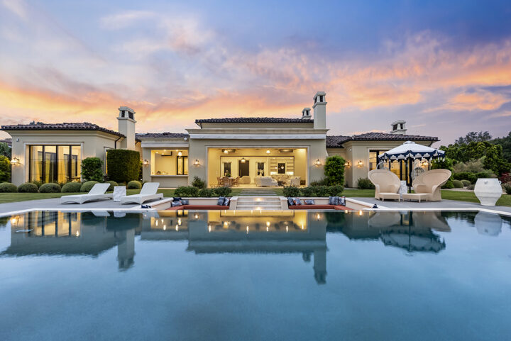 Privately tucked behind gates on nearly five acres on the coveted west side of the Covenant, 16640 El Camino Real pairs modern design with panoramic southwest views and is listed for $14,850,000