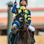 Natalie 'Jill' Baffert's Bottle of Rouge and hall of fame jockey Mike Smith beat favored stablemate Explora (Juan Hernandez up) in the Grade I $300,000 Del Mar Debutante Saturday, September 6, 2025, at Del Mar Thoroughbred Club, Del Mar, CA. Both fillies are trained by Baffert's husband, Bob Baffert. Benoit Photo