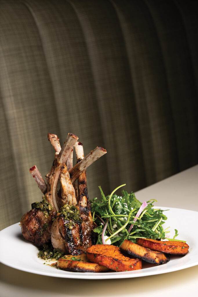 Queenstown Del Mar’s NZ Rack of Lamb: New Zealand lamb with mint chimichurri, roasted sweet potato, and a lemon vinaigrette salad