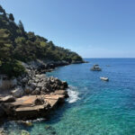 Adventurous souls can hike the curving path along waterfront cliffs in Cap Ferrat, where the bluest of waters beckon visitors for a quick dip