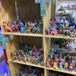 Shelves are lined with thousands of recently completed alebrijes carvings, ready to bring home as souvenirs unique to the Oaxaca