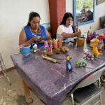 Crafting alebrijes by hand, these artists paint fanciful creatures in bright colors