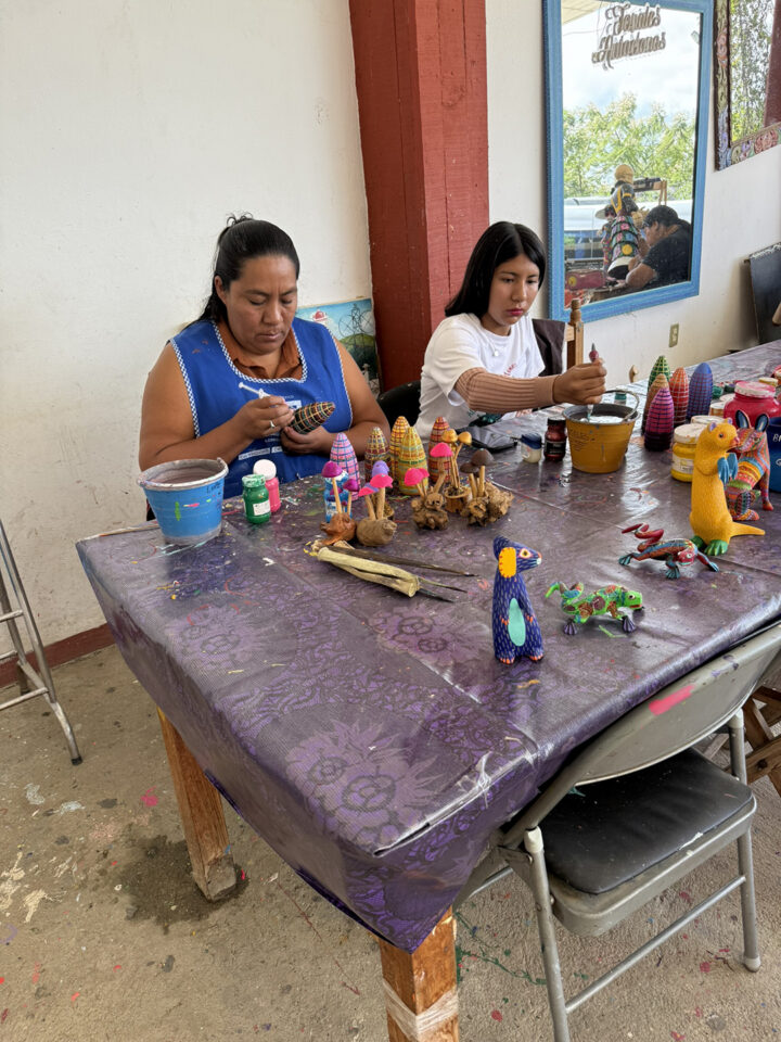 Crafting alebrijes by hand, these artists paint fanciful creatures in bright colors