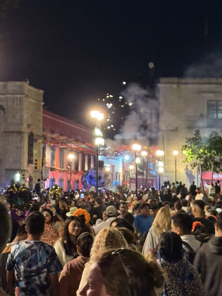 Fireworks add a festive element to the colorful streets of downtown Oaxaca during night parades