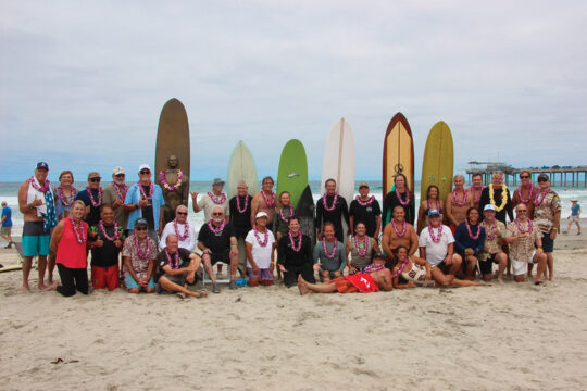 Editor’s Pick, Making Waves in Medicine: Legends of Science and Surfing Legends of Science and Surfing began in 1994 as Surf for a Cure, bringing San Diego’s surfing community together to support cancer research at Moores Cancer Center at UC San Diego Health. Today, the event pairs the Legends of Surfing Invitational with an oncology symposium and has raised more than $14 million for cancer research and innovation. Just 12 days after Kevan M. Shokat, PhD, received the 2026 Rell Sunn Award at this year’s gathering, the FDA approved Rasonque (daraxonrasib), a first-in-class targeted therapy for metastatic pancreatic cancer. Shokat’s pioneering research helped overturn the long-held belief that KRAS, one of cancer’s most important drivers, was “undruggable,” laying important scientific groundwork for a new generation of RAS-directed cancer therapies. mcclegends.ucsd.edu M.P.