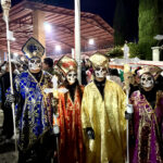 A ghostly procession makes its way through the crowds at the Battle of the Bands