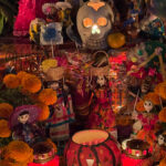 Cemeteries in Oaxaca include graves decorated with colorful flowers, candles and more in honor of departed family members